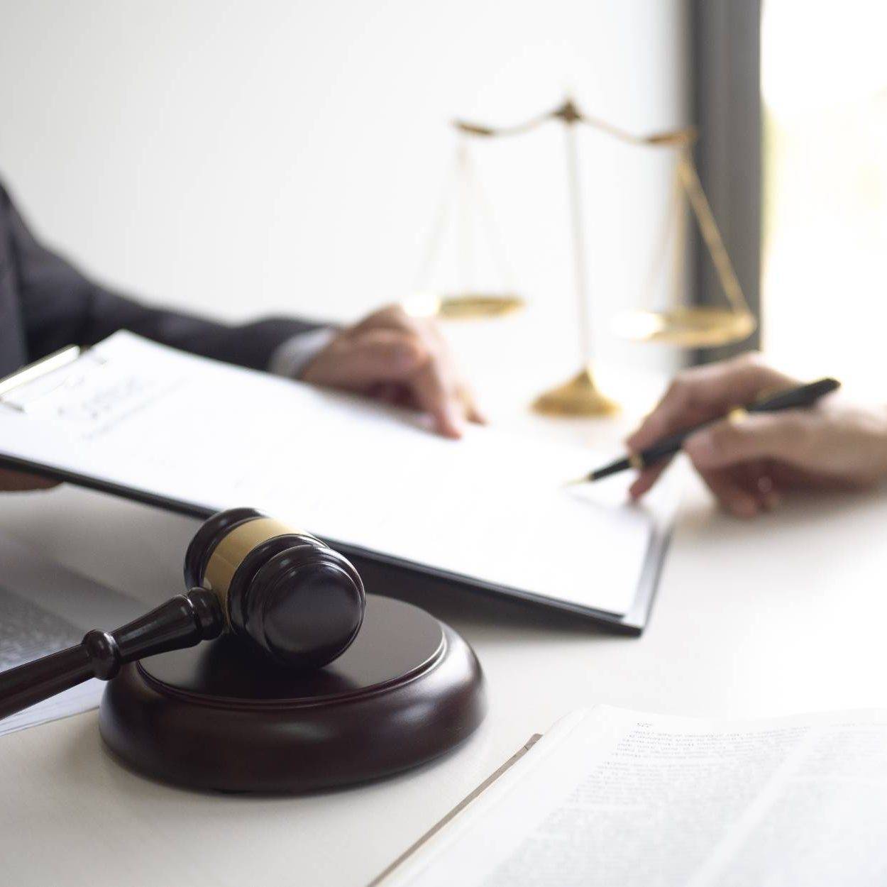 Lawyer And Client With Legal Contract Signing In Law Firm.